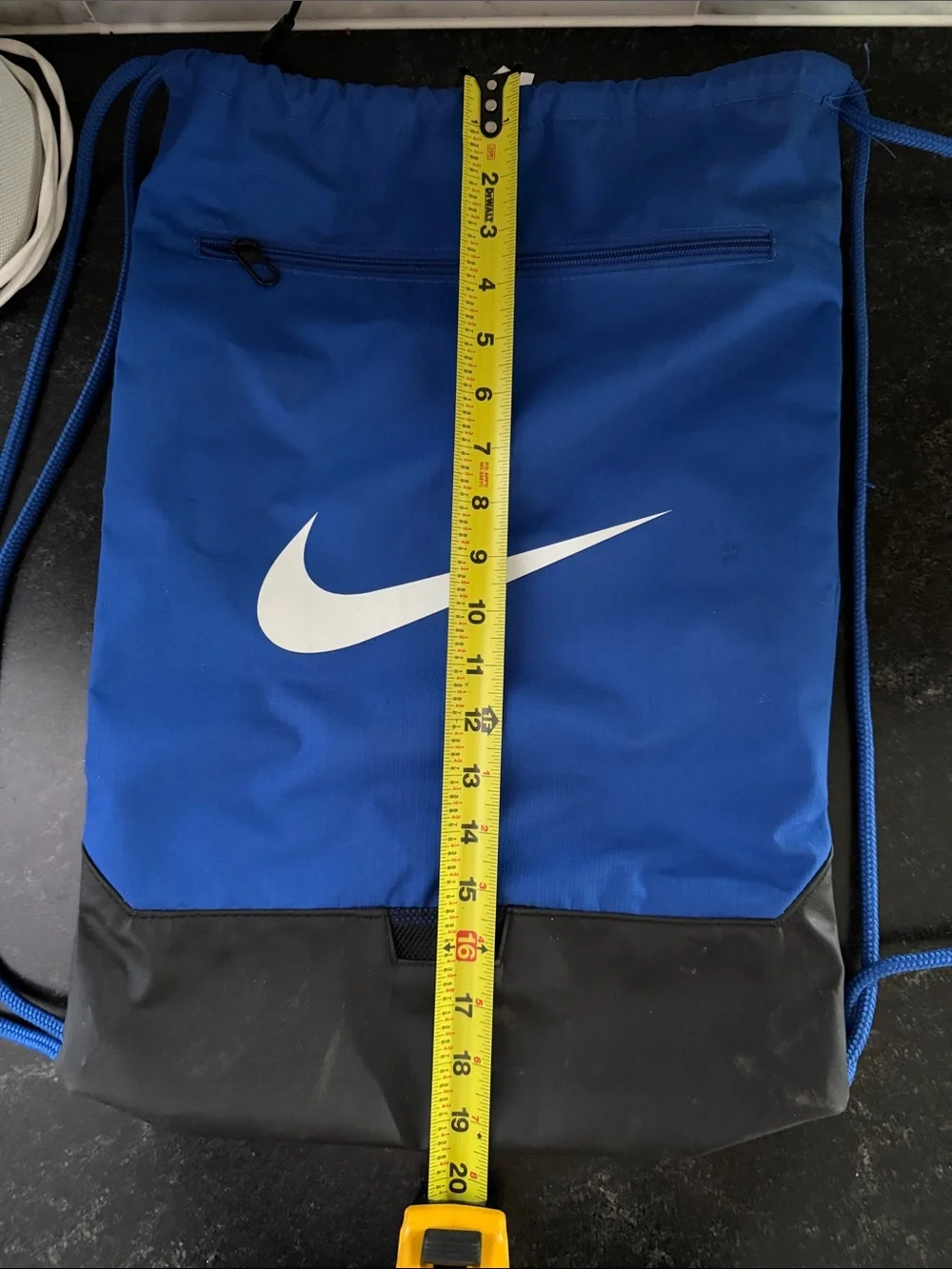 Nike Royal Blue Drawstring Backpack with White Swoosh and Black Base